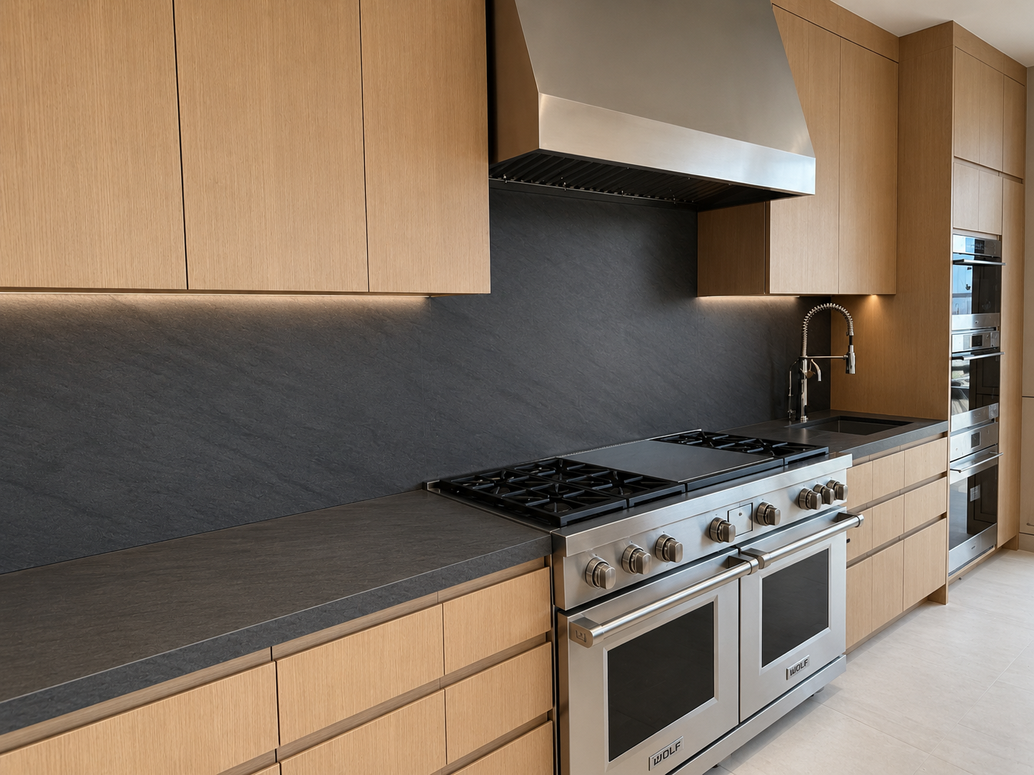 Custom Kitchen Range with Dark Backsplash